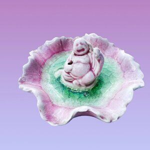 Pastel Buddha on lotus leaf